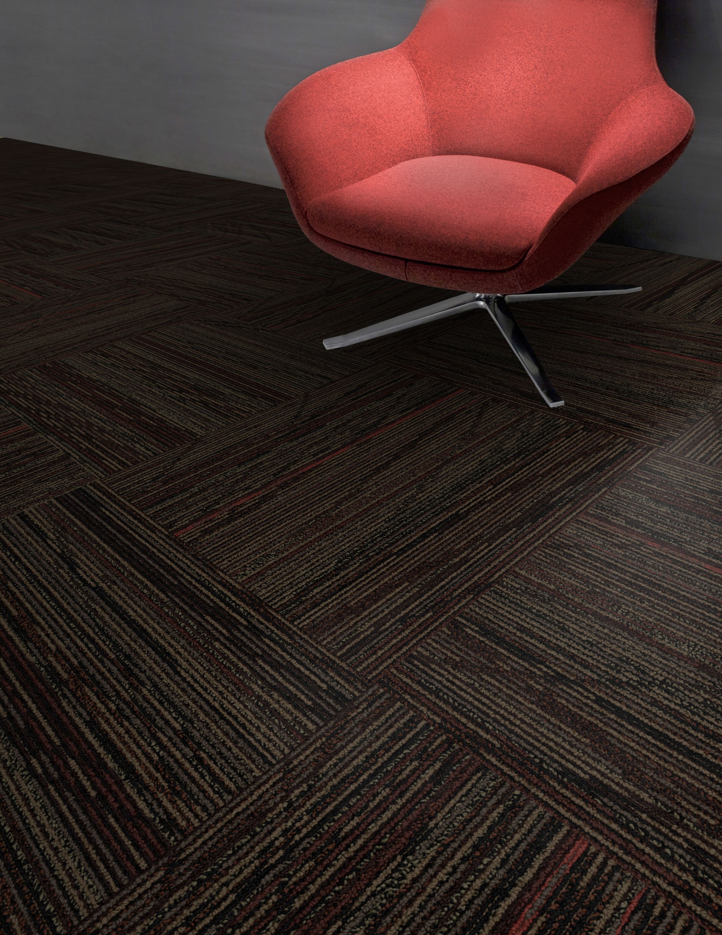 Detail of Interface Prairie Grass Loop carpet tile with red chair imagen número 3